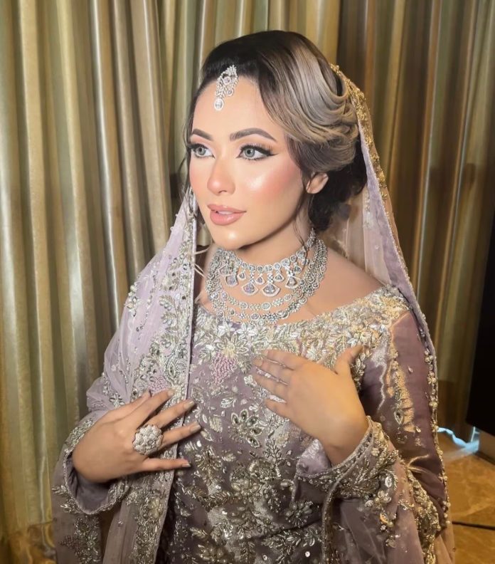 Bridal makeup with a sculpted updo hairstyle